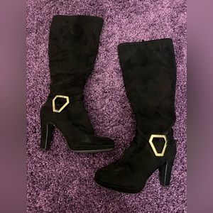 Heeled knee high boot